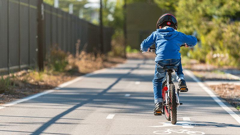 child riding bicycle